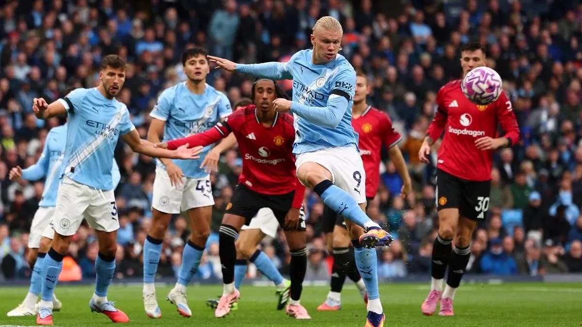 Erling Haaland kicking the ball during Manchester derby Erling Haaland kicking the ball during Manchester derby