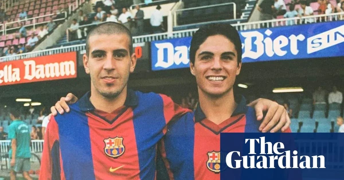 Two young football players in FC Barcelona jerseys Two young football players in FC Barcelona jerseys