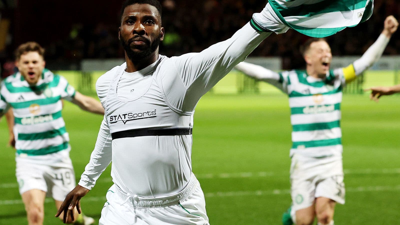 Player celebrating with teammates after scoring goal Player celebrating with teammates after scoring goal
