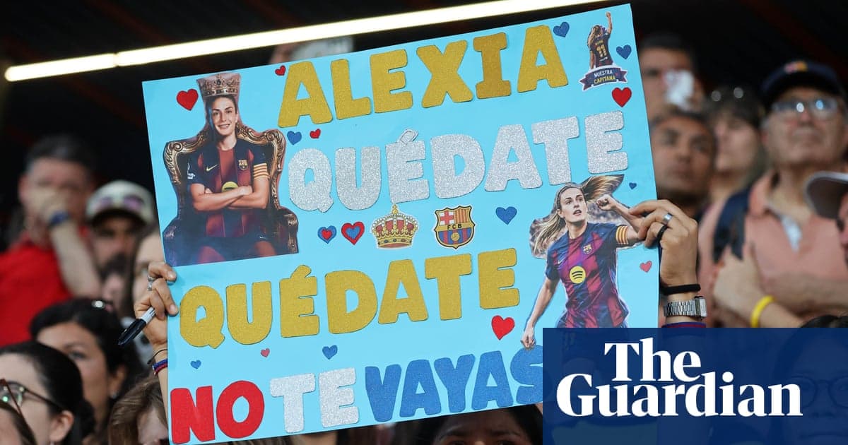 Fan holding sign supporting player at match Fan holding sign supporting player at match