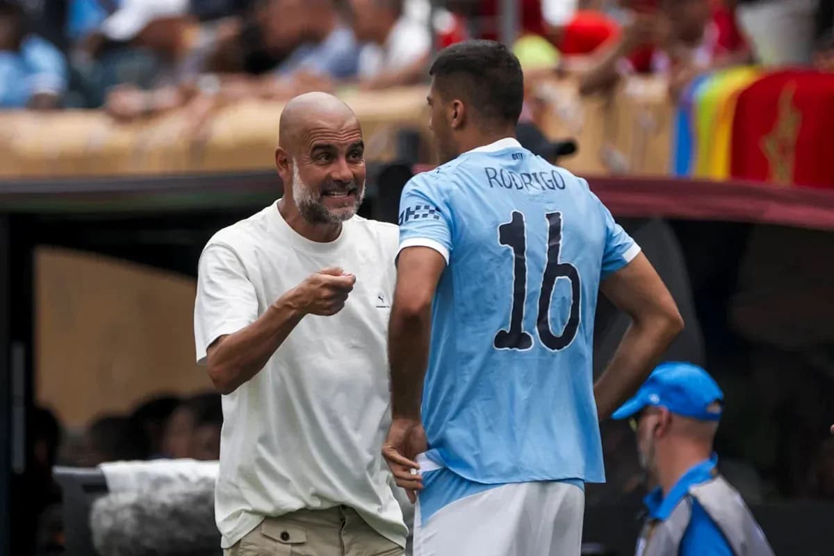 Manager speaking to player during match substitution Manager speaking to player during match substitution