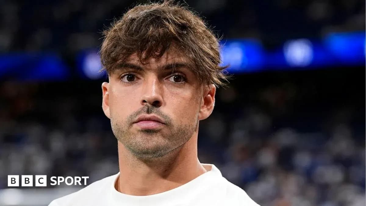 Player looking directly at the camera on pitch Player looking directly at the camera on pitch