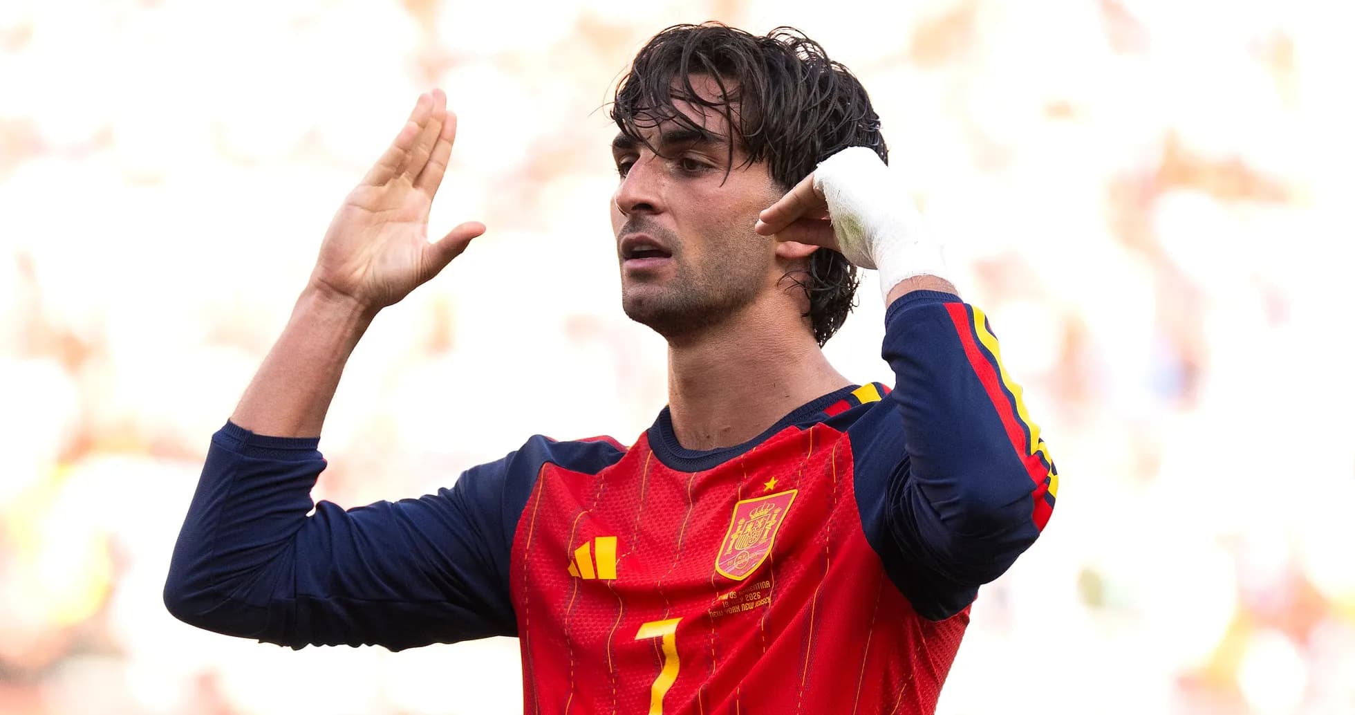 Player celebrating with hand gesture during match Player celebrating with hand gesture during match