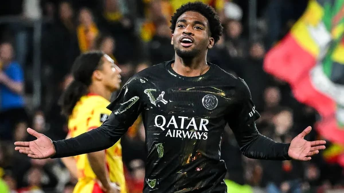 Player celebrating a goal in black jersey Player celebrating a goal in black jersey