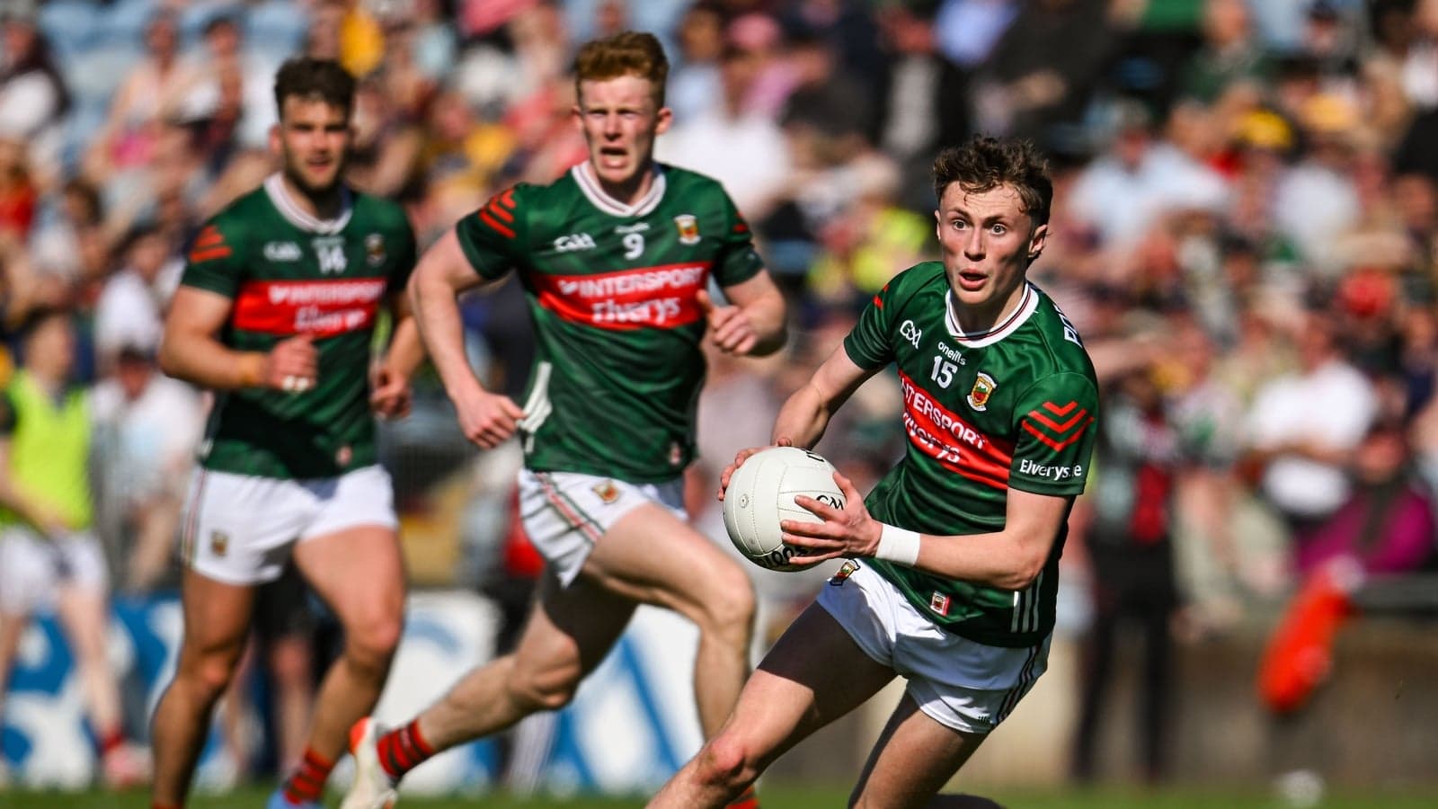 Mayo players in action during a Gaelic football match Mayo players in action during a Gaelic football match