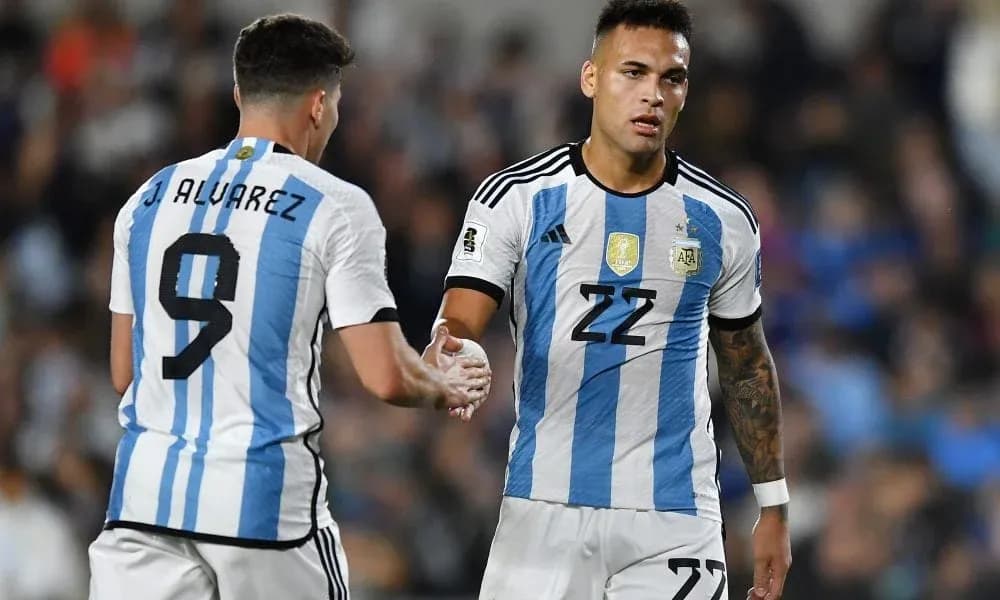 Argentina players exchanging a handshake on field Argentina players exchanging a handshake on field