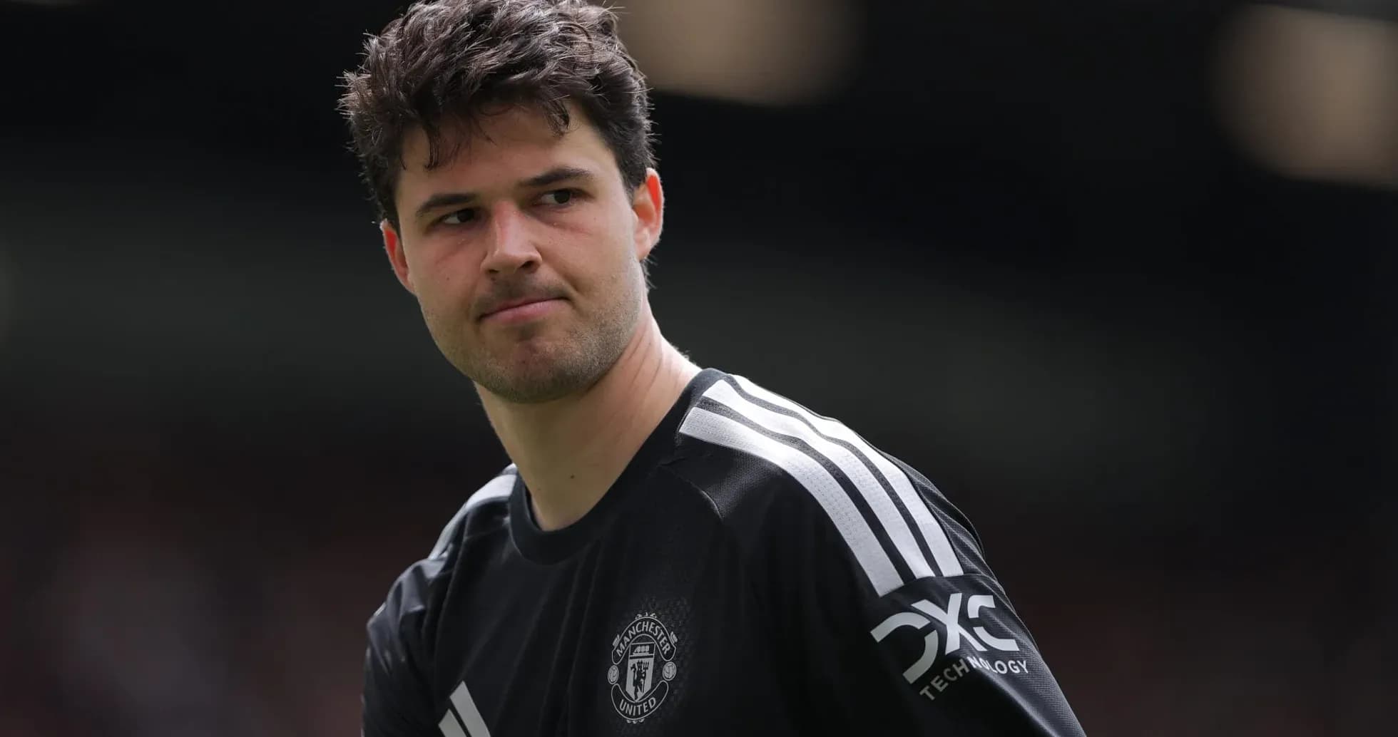 Goalkeeper in Manchester United kit on pitch Goalkeeper in Manchester United kit on pitch