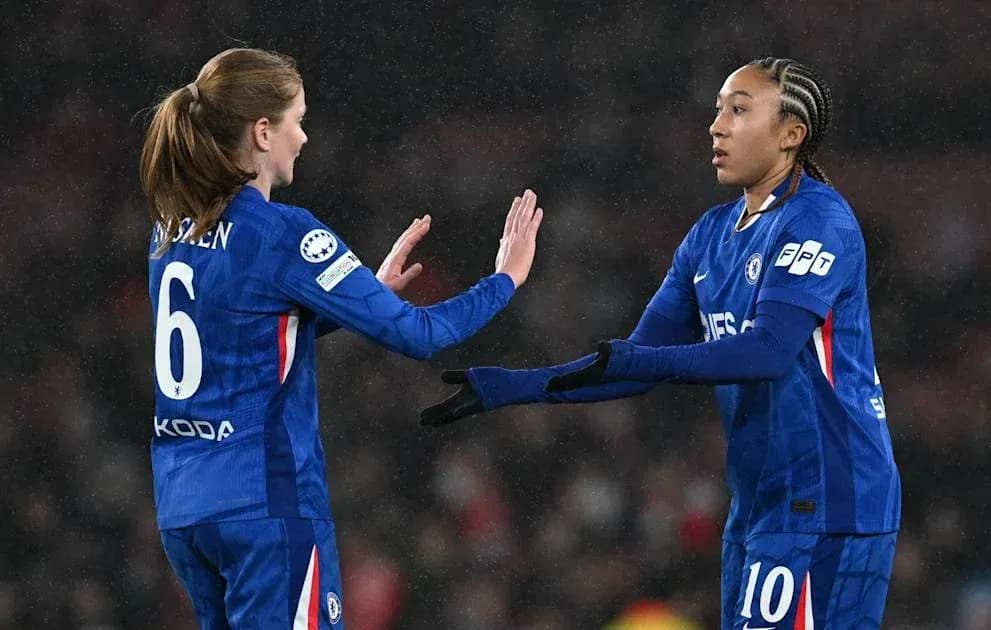Two Chelsea players celebrating during match Two Chelsea players celebrating during match