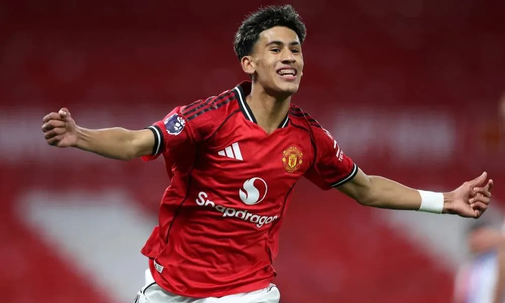 Player celebrating goal in Manchester United jersey Player celebrating goal in Manchester United jersey