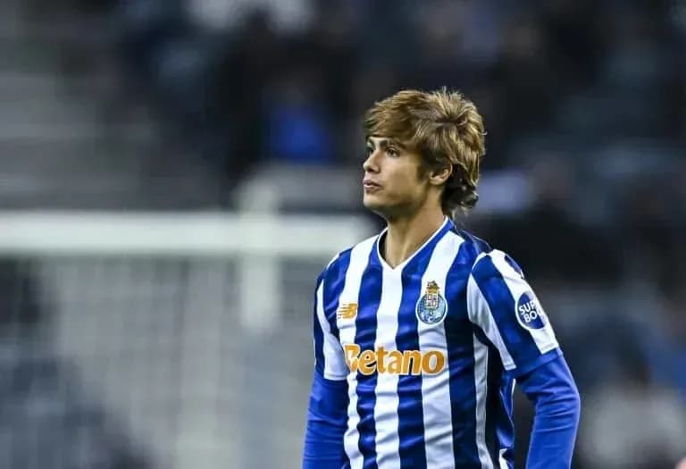 Player in FC Porto kit on the pitch Player in FC Porto kit on the pitch