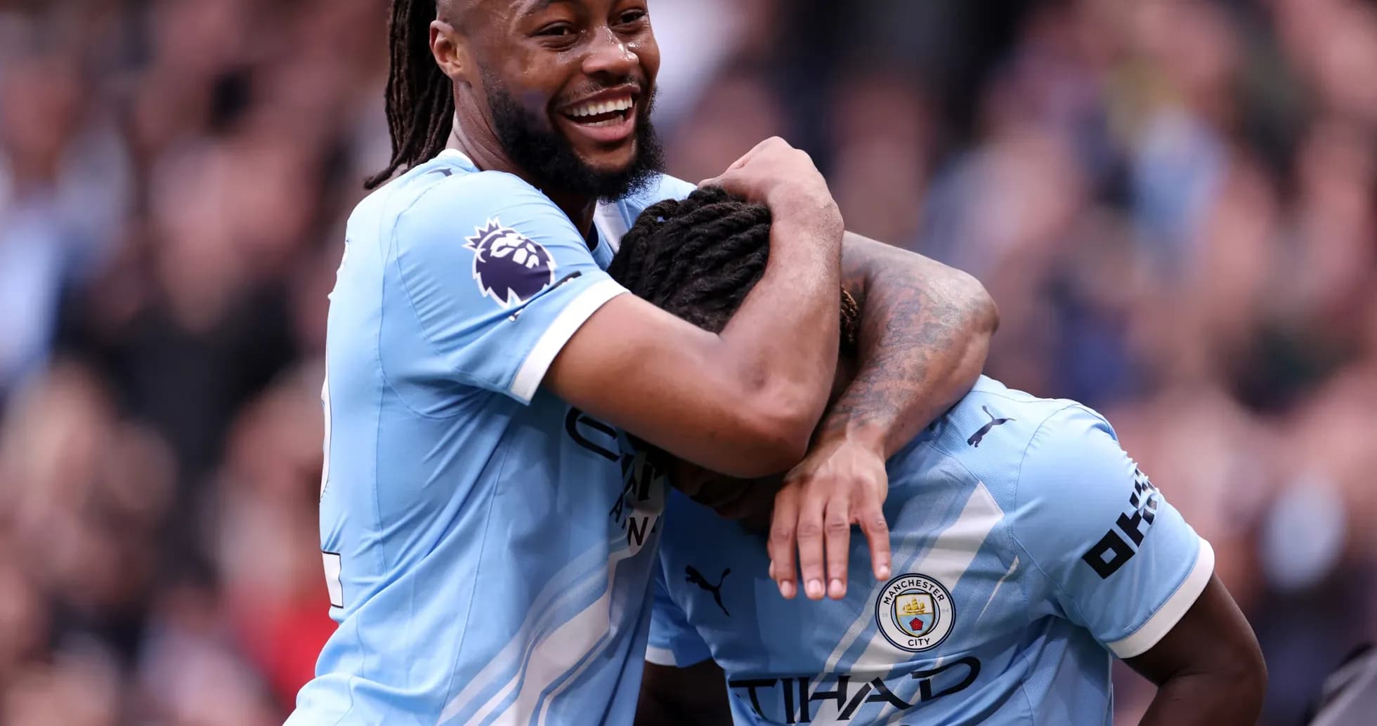 Manchester City players celebrating a goal Manchester City players celebrating a goal