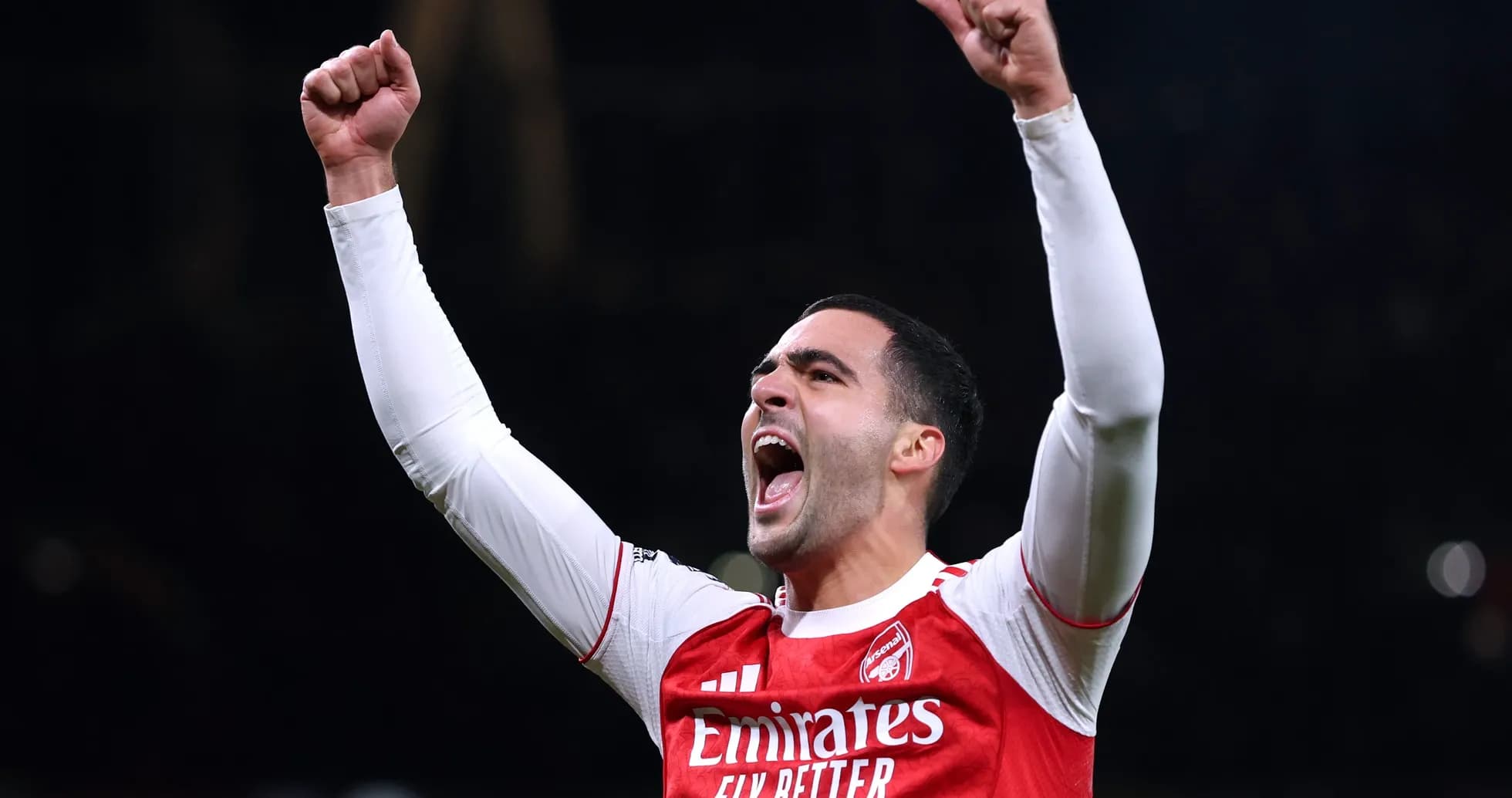 Player celebrating with raised fists after a victory Player celebrating with raised fists after a victory