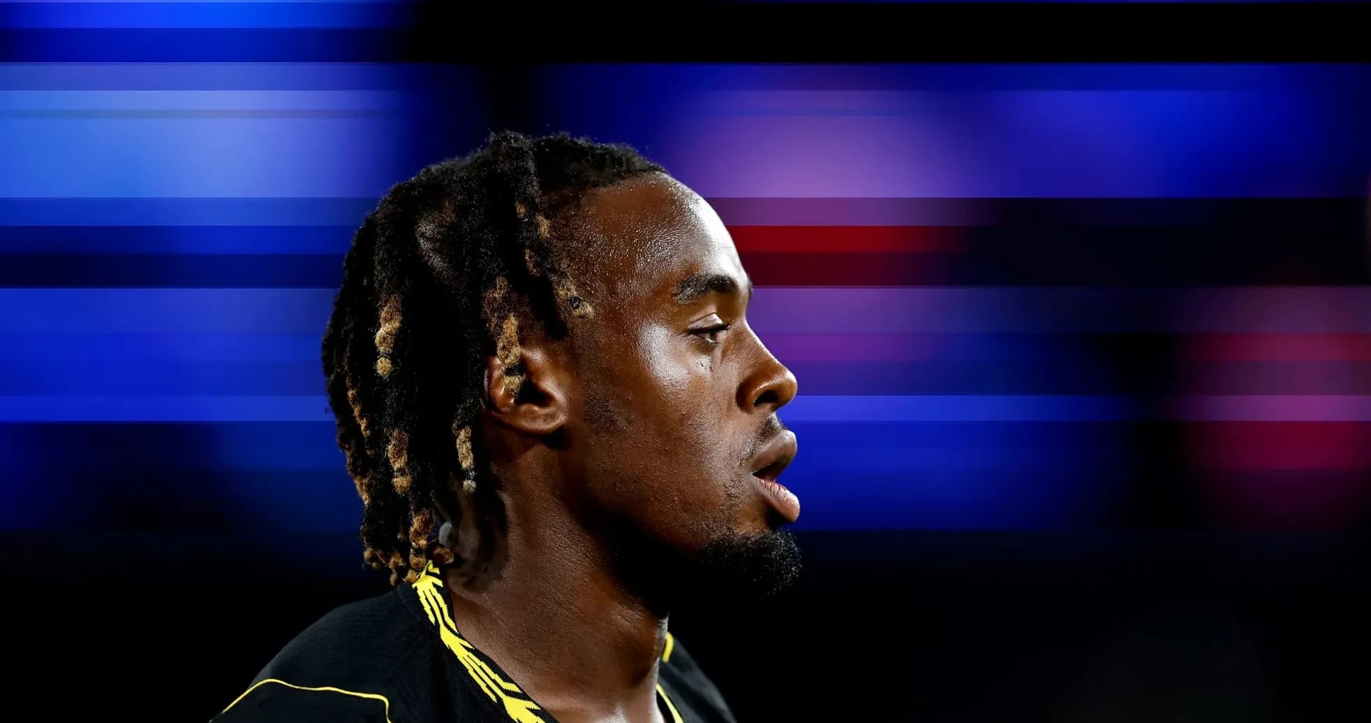 Athlete in profile with blurred background Athlete in profile with blurred background