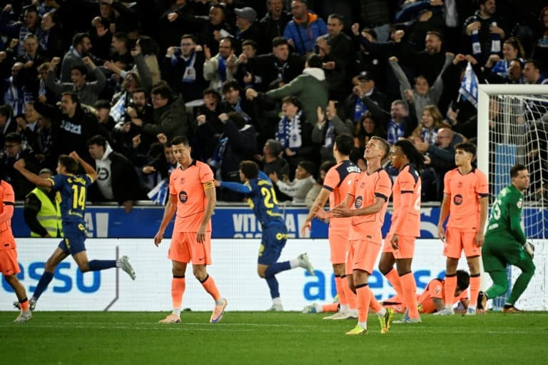 Players reacting during a tense football match Players reacting during a tense football match