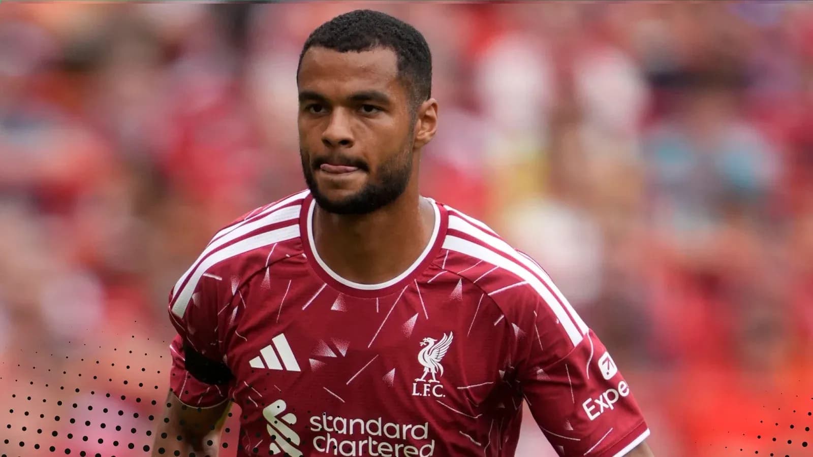 Player wearing Liverpool kit on the pitch Player wearing Liverpool kit on the pitch