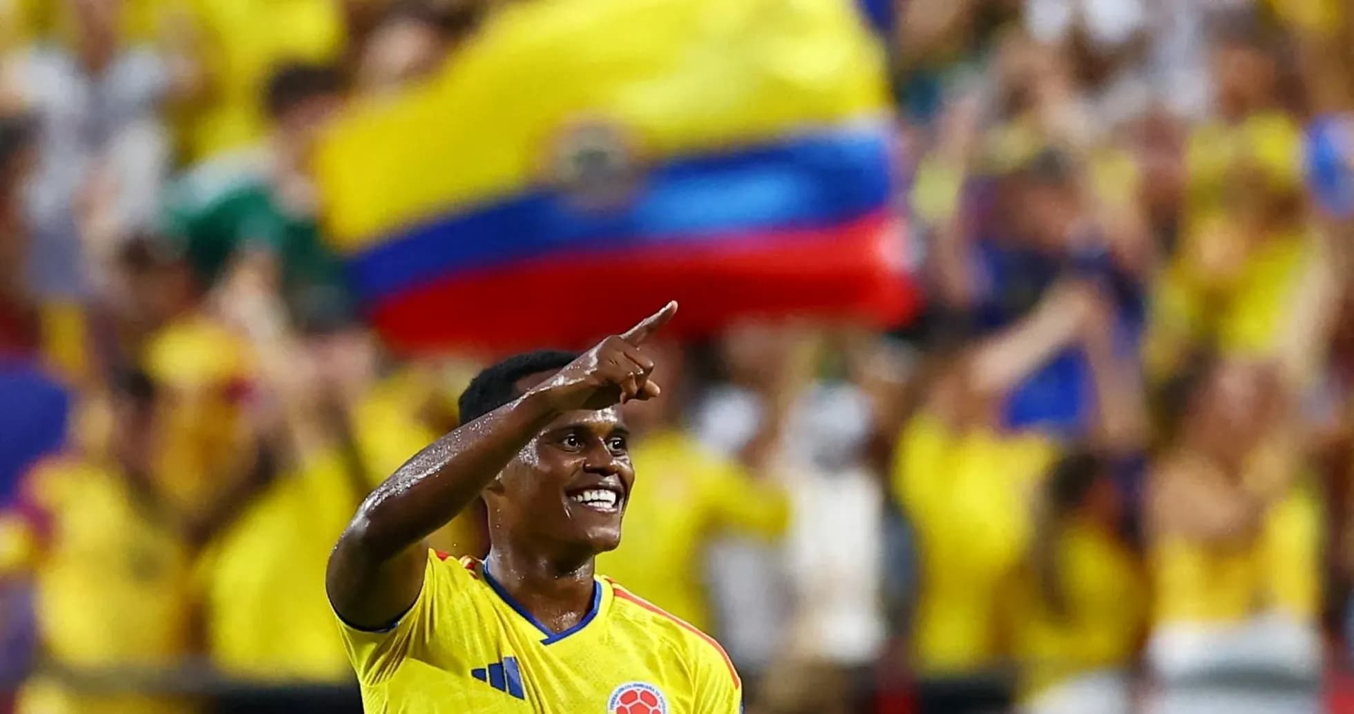 Colombian player celebrating in front of fans Colombian player celebrating in front of fans