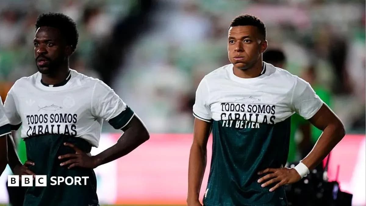 Two players wearing matching shirts before the match Two players wearing matching shirts before the match