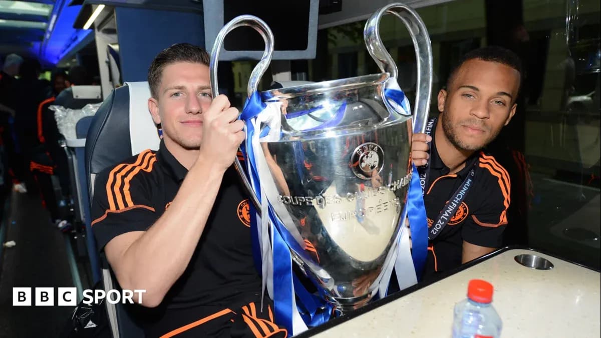 Players celebrating with UEFA Champions League trophy Players celebrating with UEFA Champions League trophy
