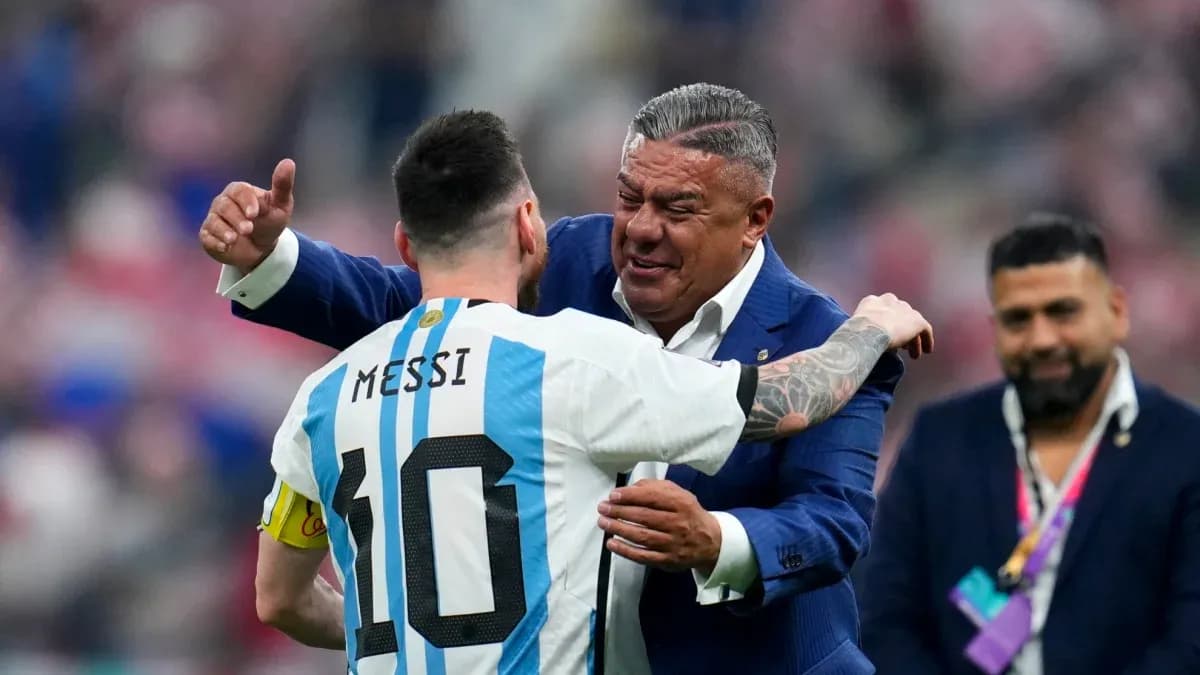 Lionel Messi embraces a coach after a match Lionel Messi embraces a coach after a match