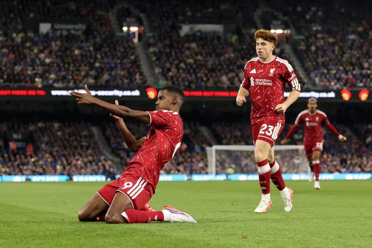 Liverpool player celebrating after scoring a goal Liverpool player celebrating after scoring a goal