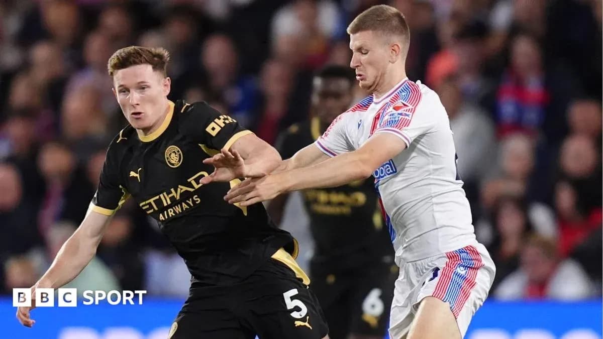 Two players competing for possession during match Two players competing for possession during match