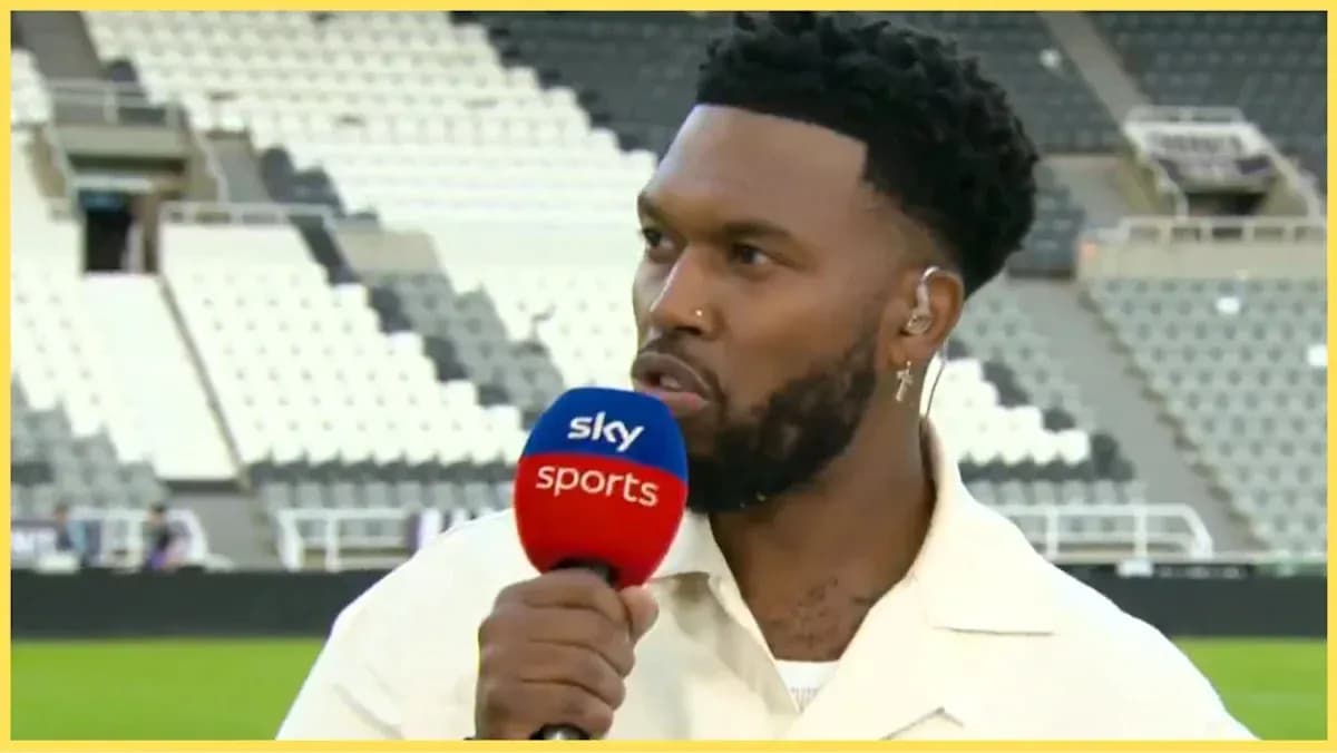 Sports commentator speaking into microphone on field Sports commentator speaking into microphone on field