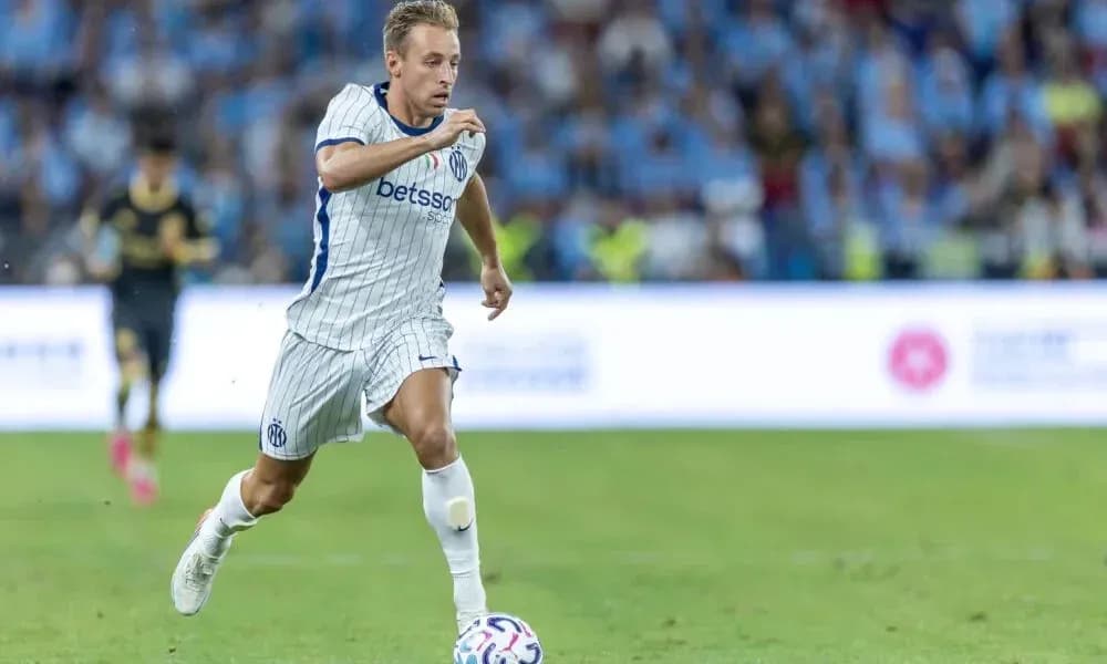 Player running with ball during match on field Player running with ball during match on field