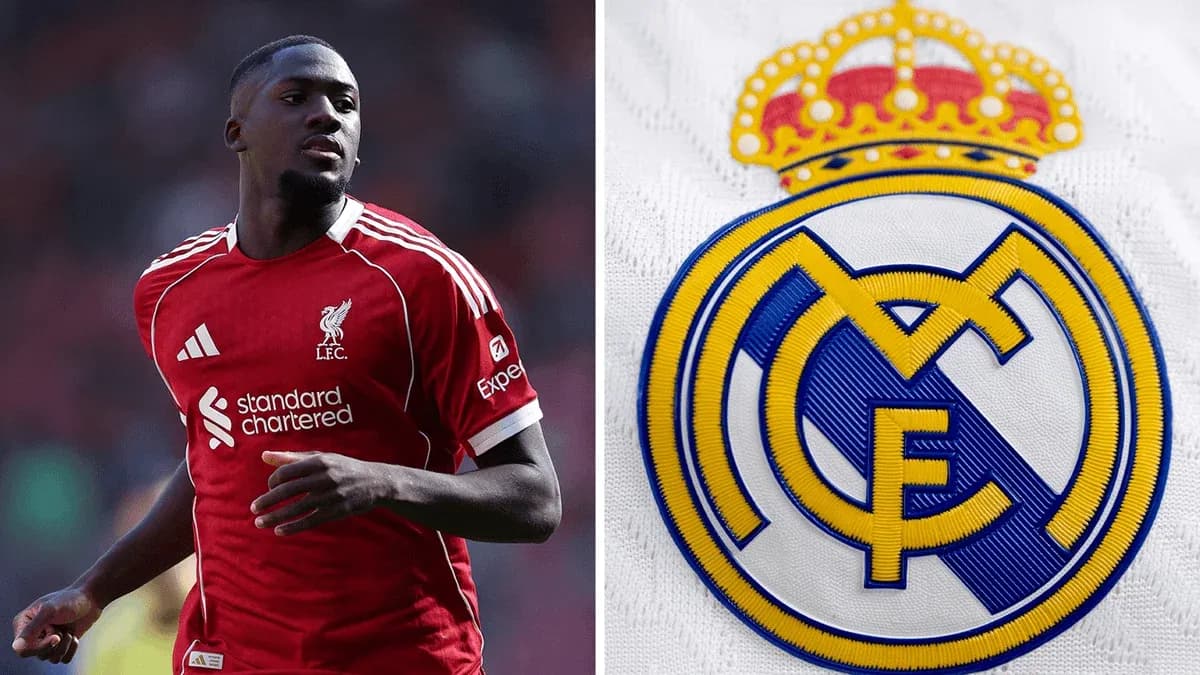 Player in Liverpool kit alongside Real Madrid logo Player in Liverpool kit alongside Real Madrid logo
