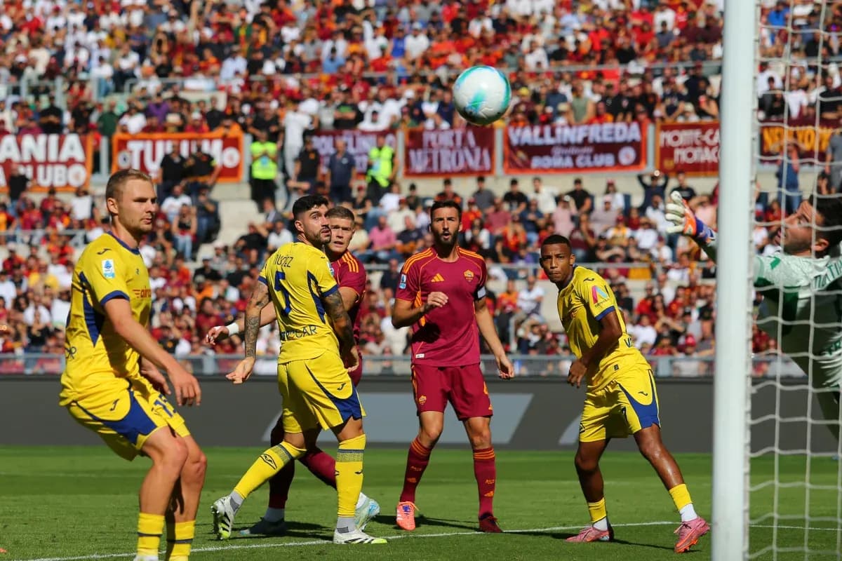 Players from Hellas Verona and AS Roma during match Players from Hellas Verona and AS Roma during match