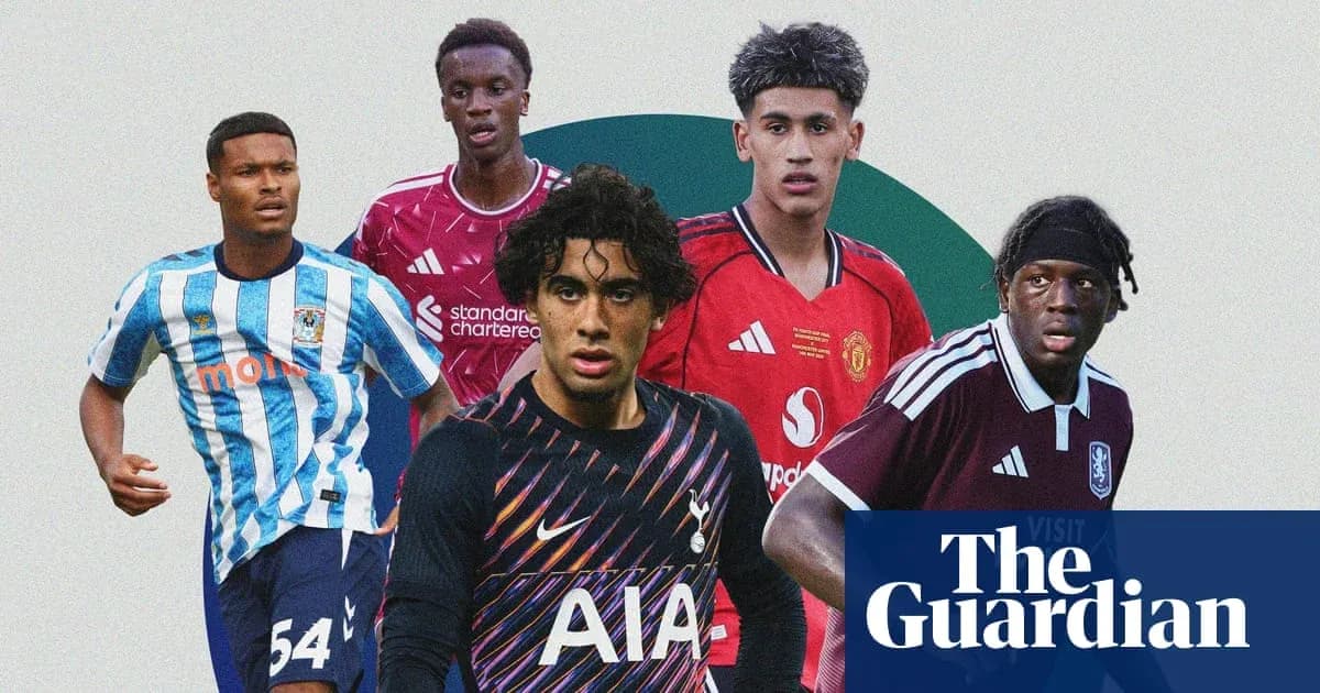 Five young football players in team kits Five young football players in team kits
