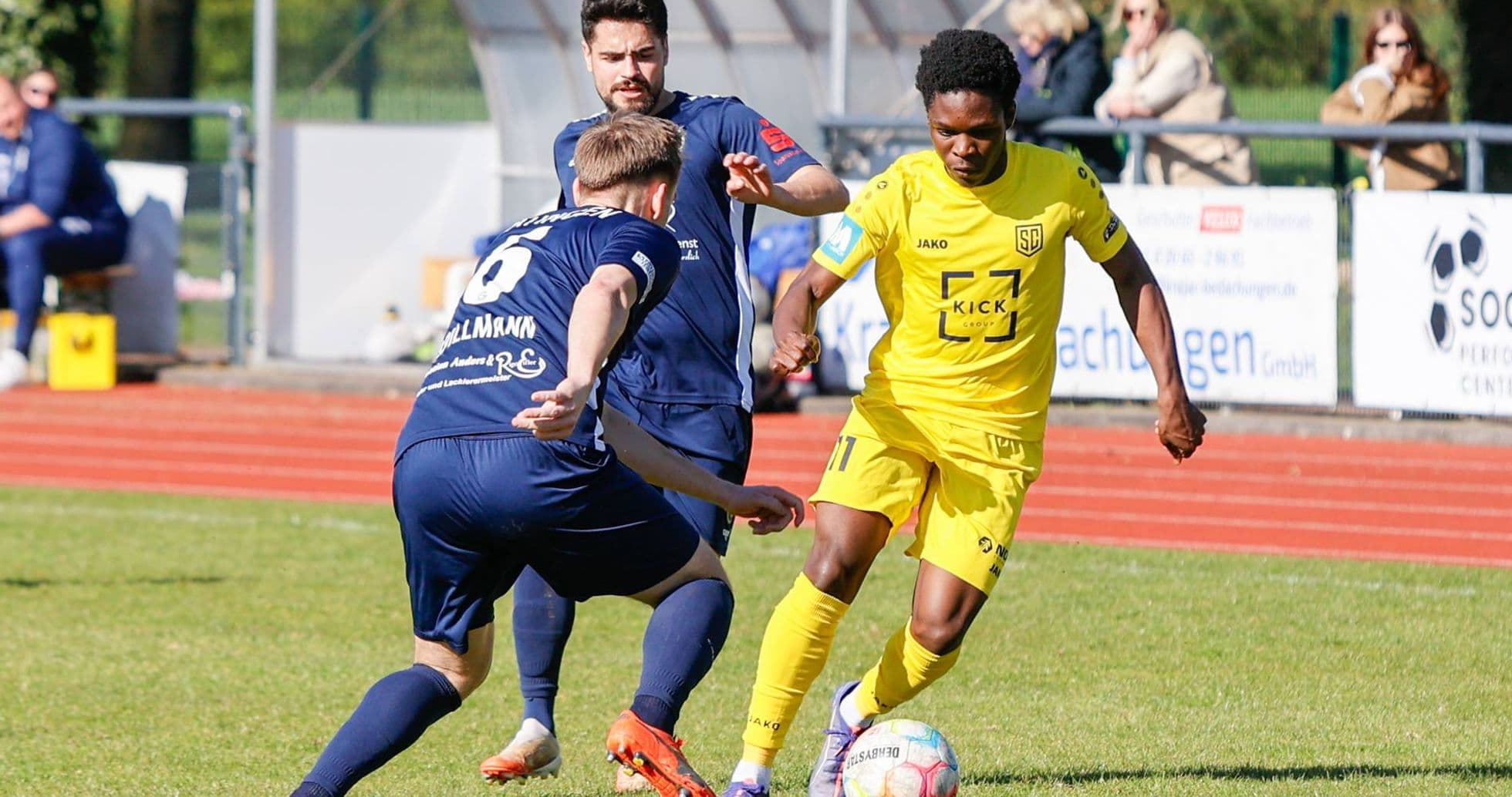 Player dribbling the ball during Oberliga match Player dribbling the ball during Oberliga match