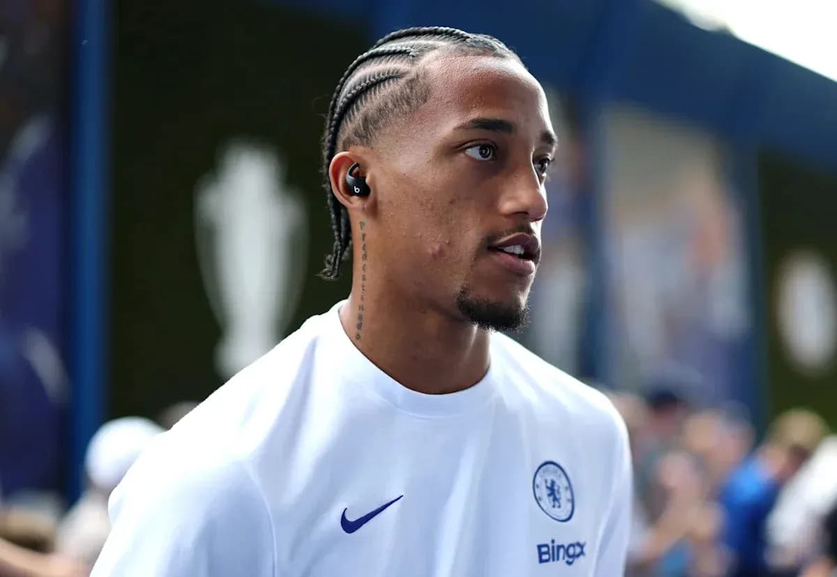 Player wearing Chelsea jersey with headphones Player wearing Chelsea jersey with headphones