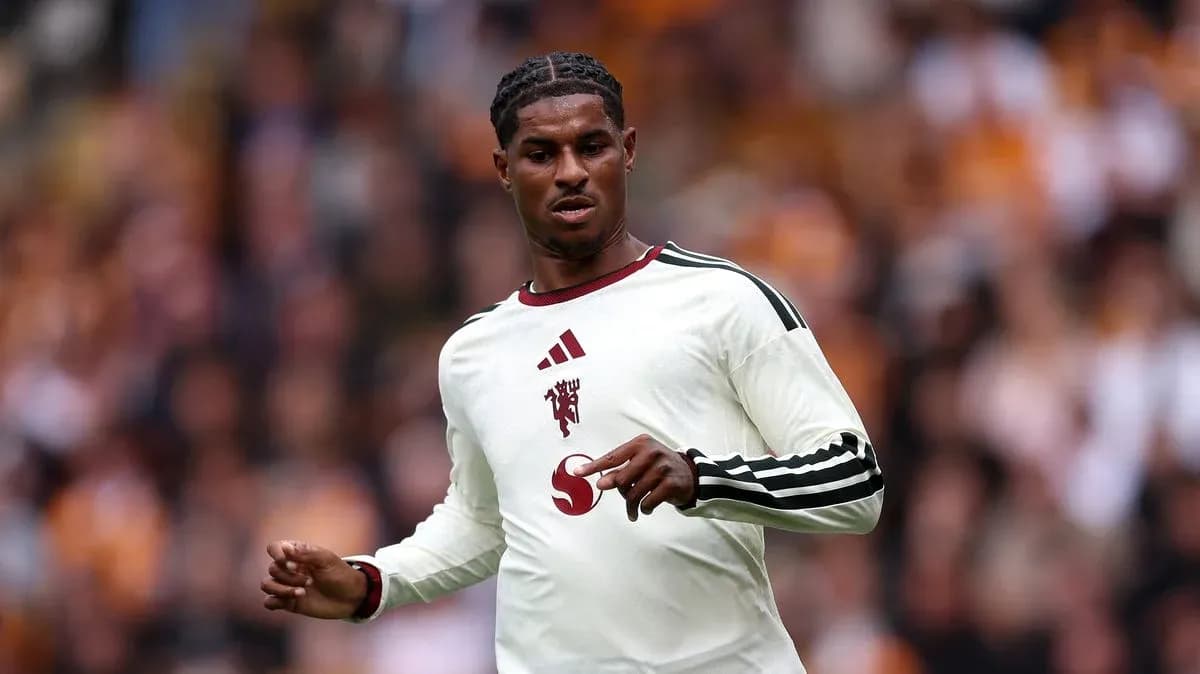 Player in white jersey during match action Player in white jersey during match action