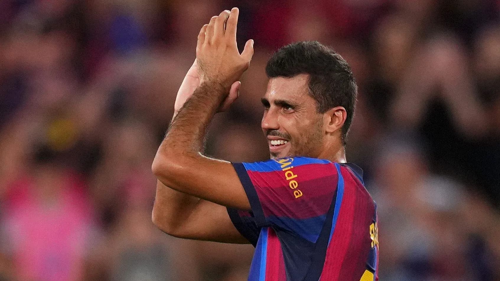 Player applauding fans during match celebration Player applauding fans during match celebration