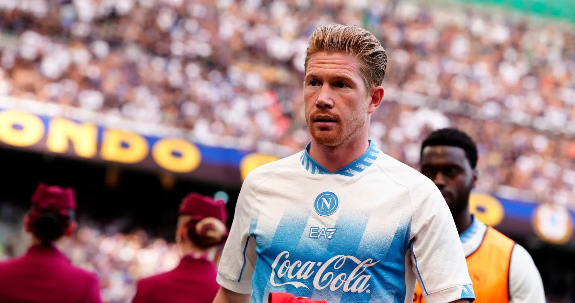 Player walking onto the pitch in Napoli kit Player walking onto the pitch in Napoli kit