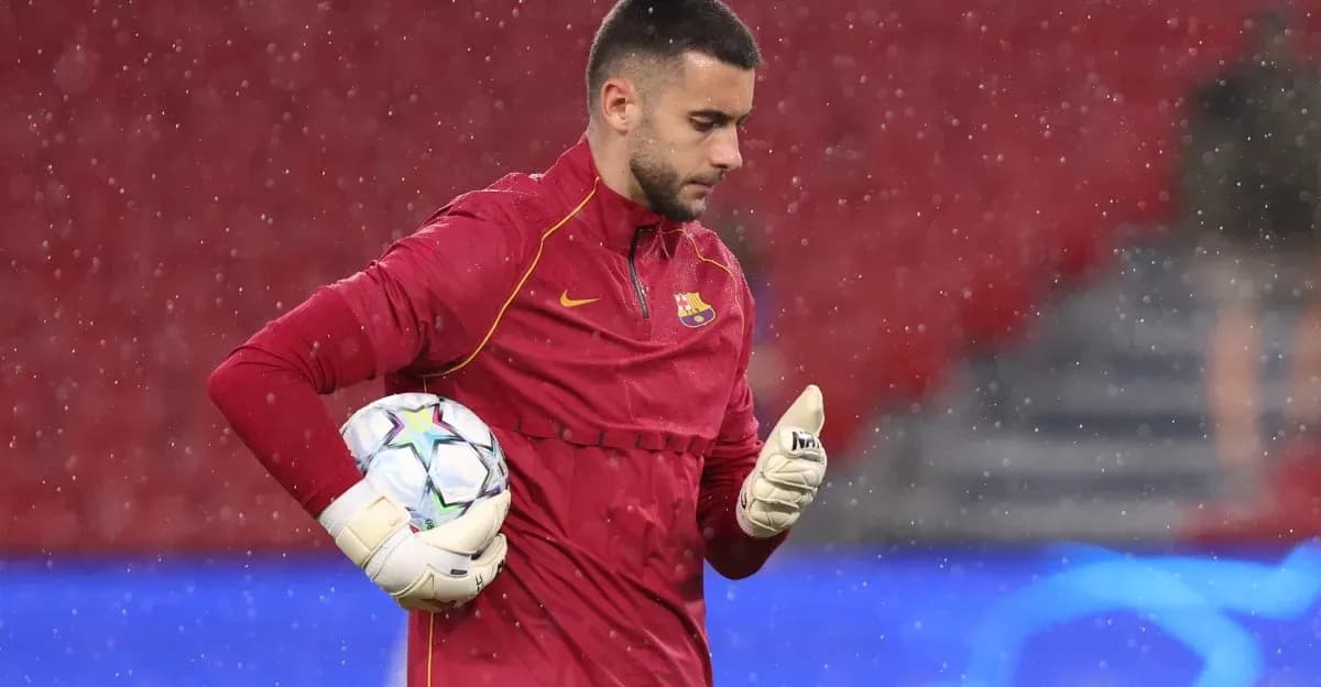 Goalkeeper in training session holding a soccer ball Goalkeeper in training session holding a soccer ball