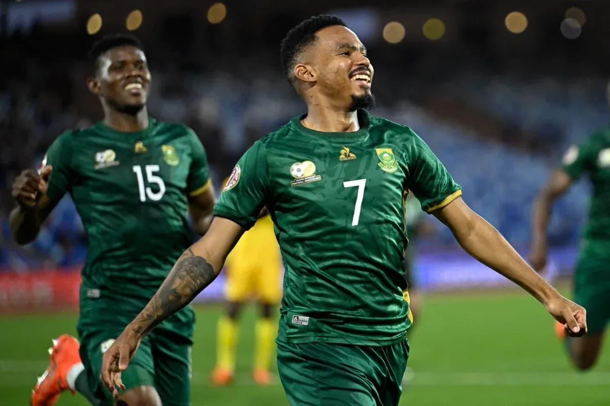 Player celebrating a goal during a football match Player celebrating a goal during a football match
