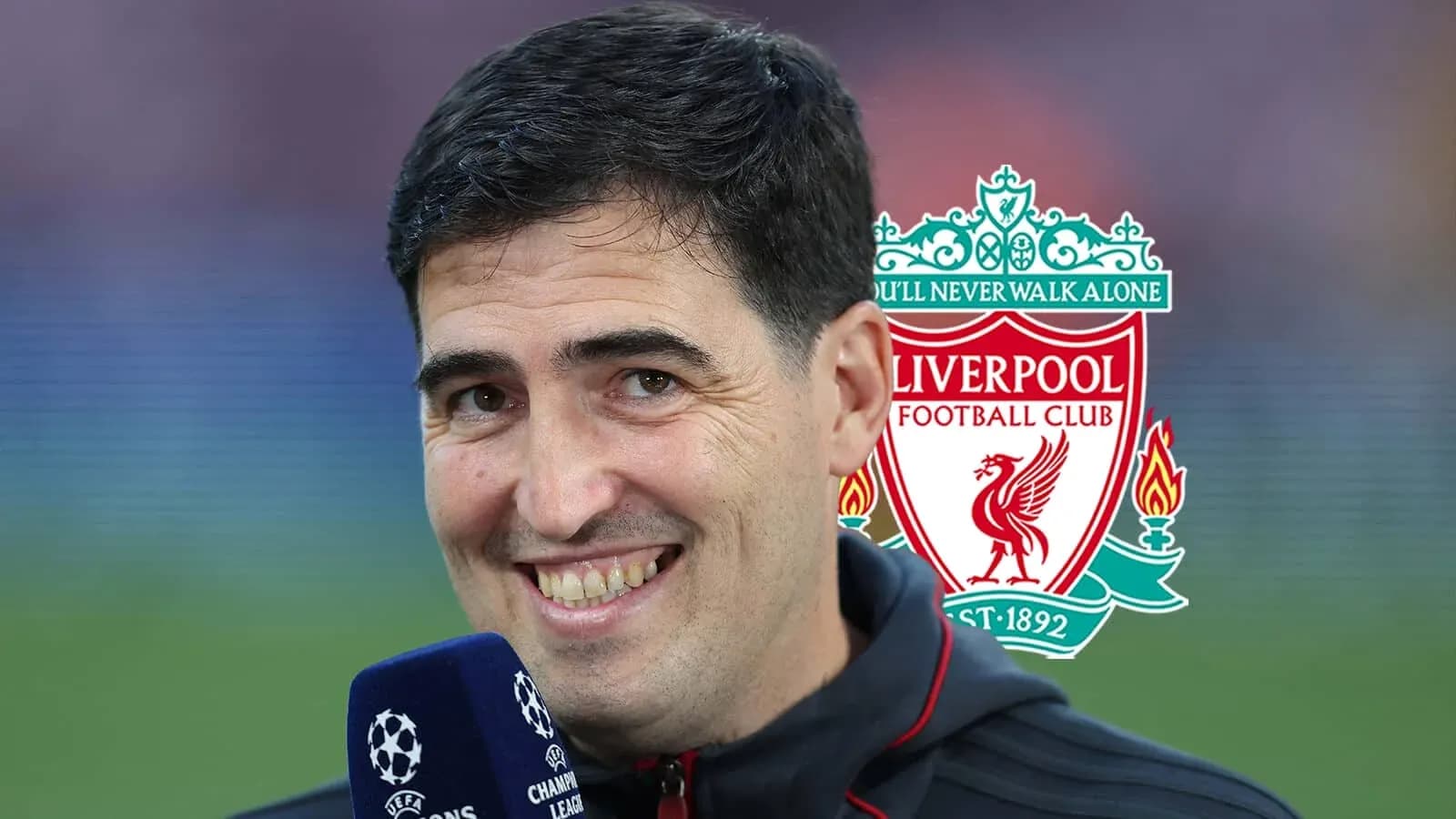 Presenter smiling with Liverpool logo in background Presenter smiling with Liverpool logo in background
