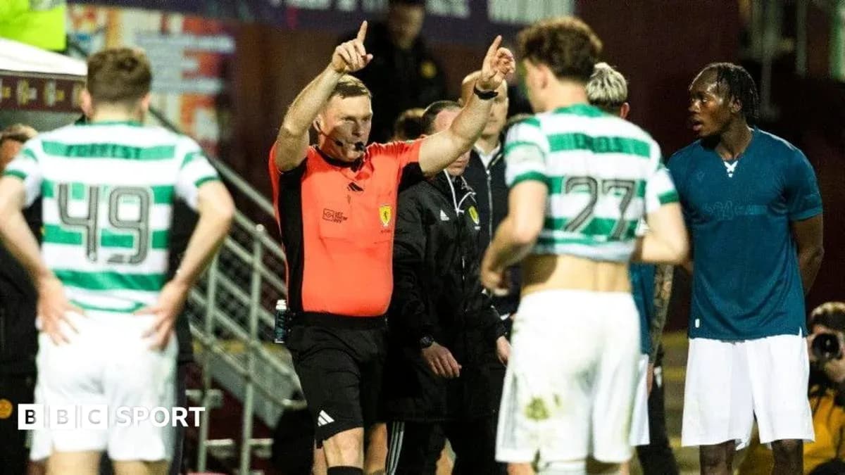 Referee issuing a decision during a football match Referee issuing a decision during a football match