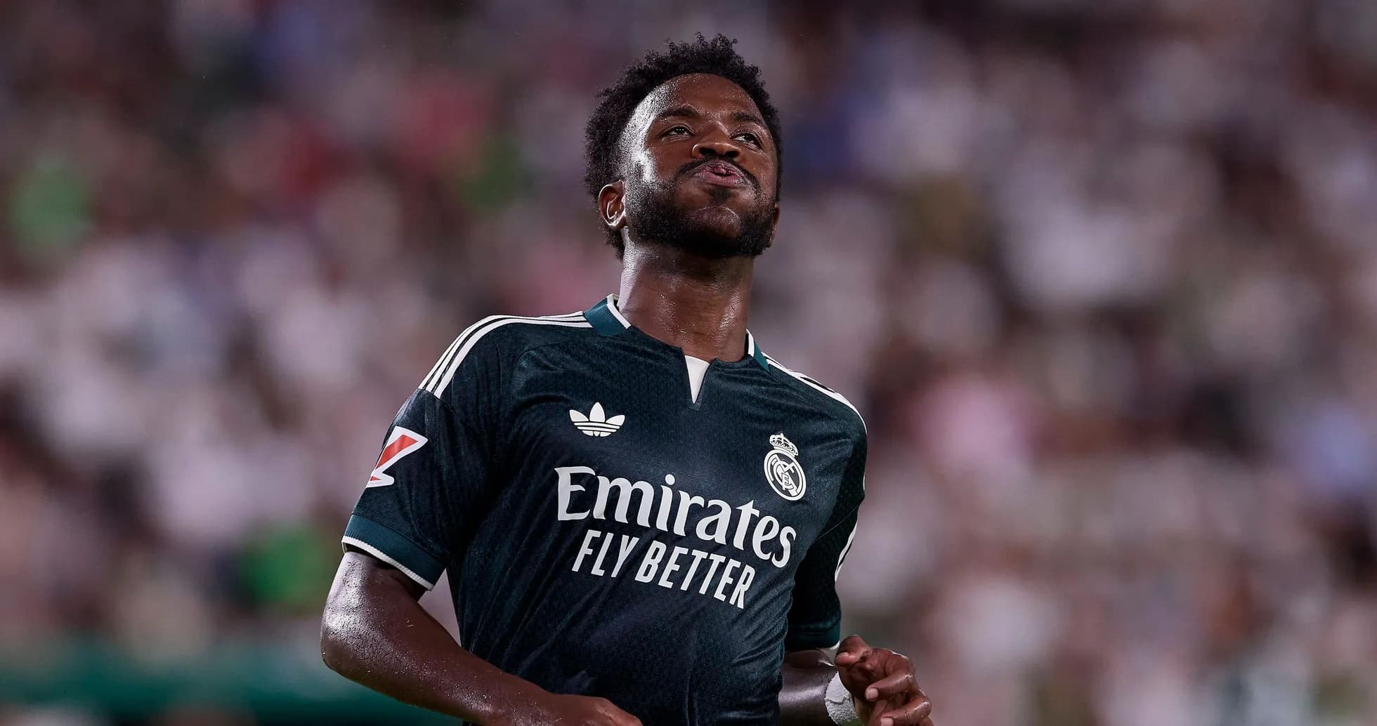 Player in Real Madrid kit on the field Player in Real Madrid kit on the field