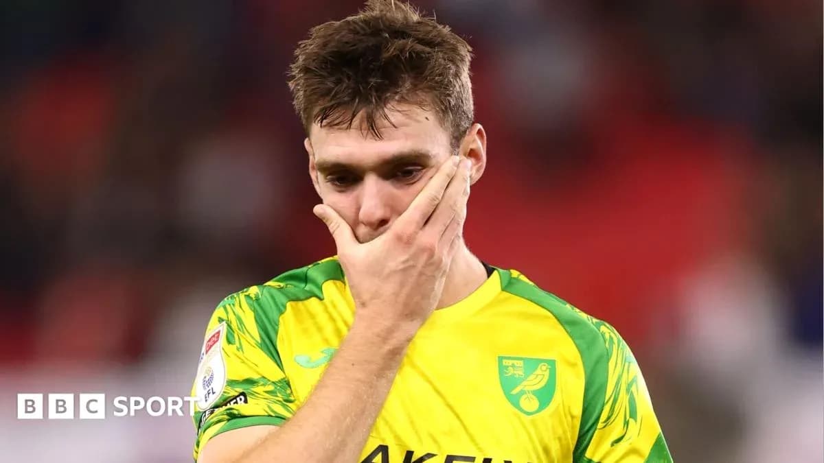 Player in yellow kit looking disappointed after match Player in yellow kit looking disappointed after match