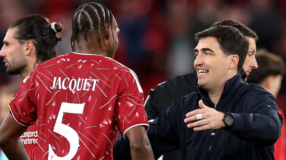 Player Jacquet interacting with coach after match Player Jacquet interacting with coach after match