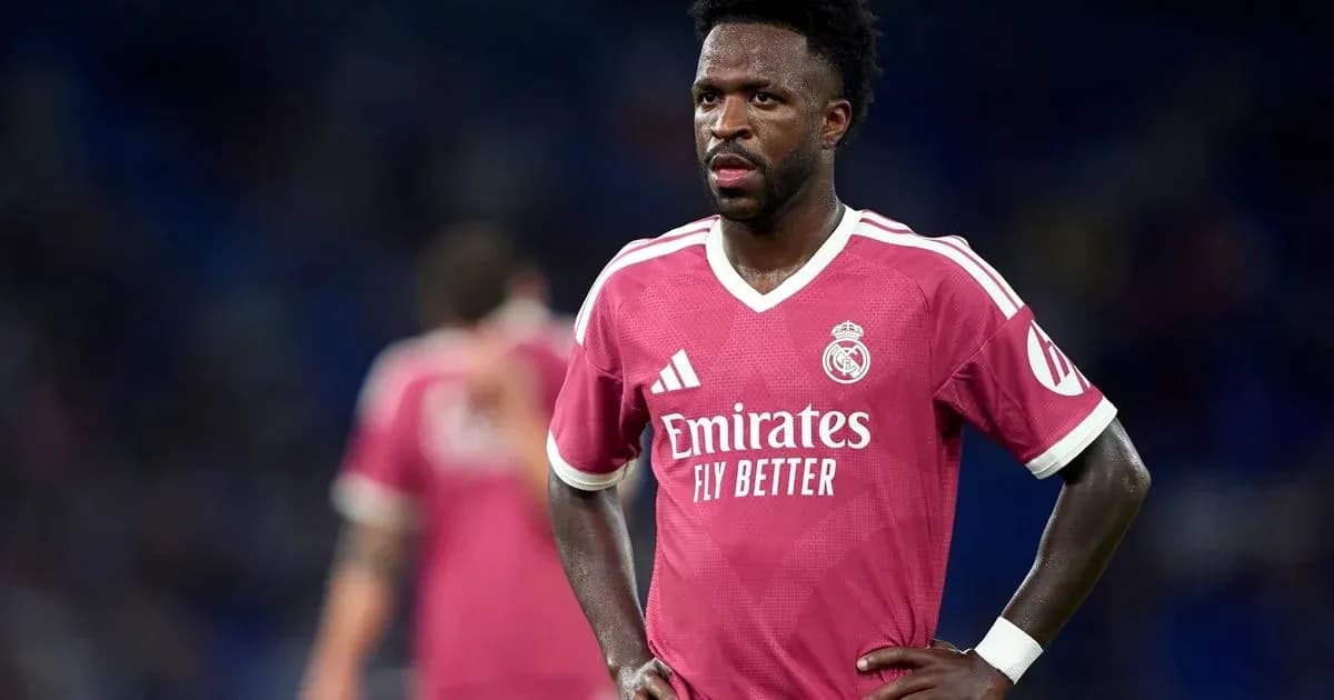 Player in pink Real Madrid kit on the field Player in pink Real Madrid kit on the field